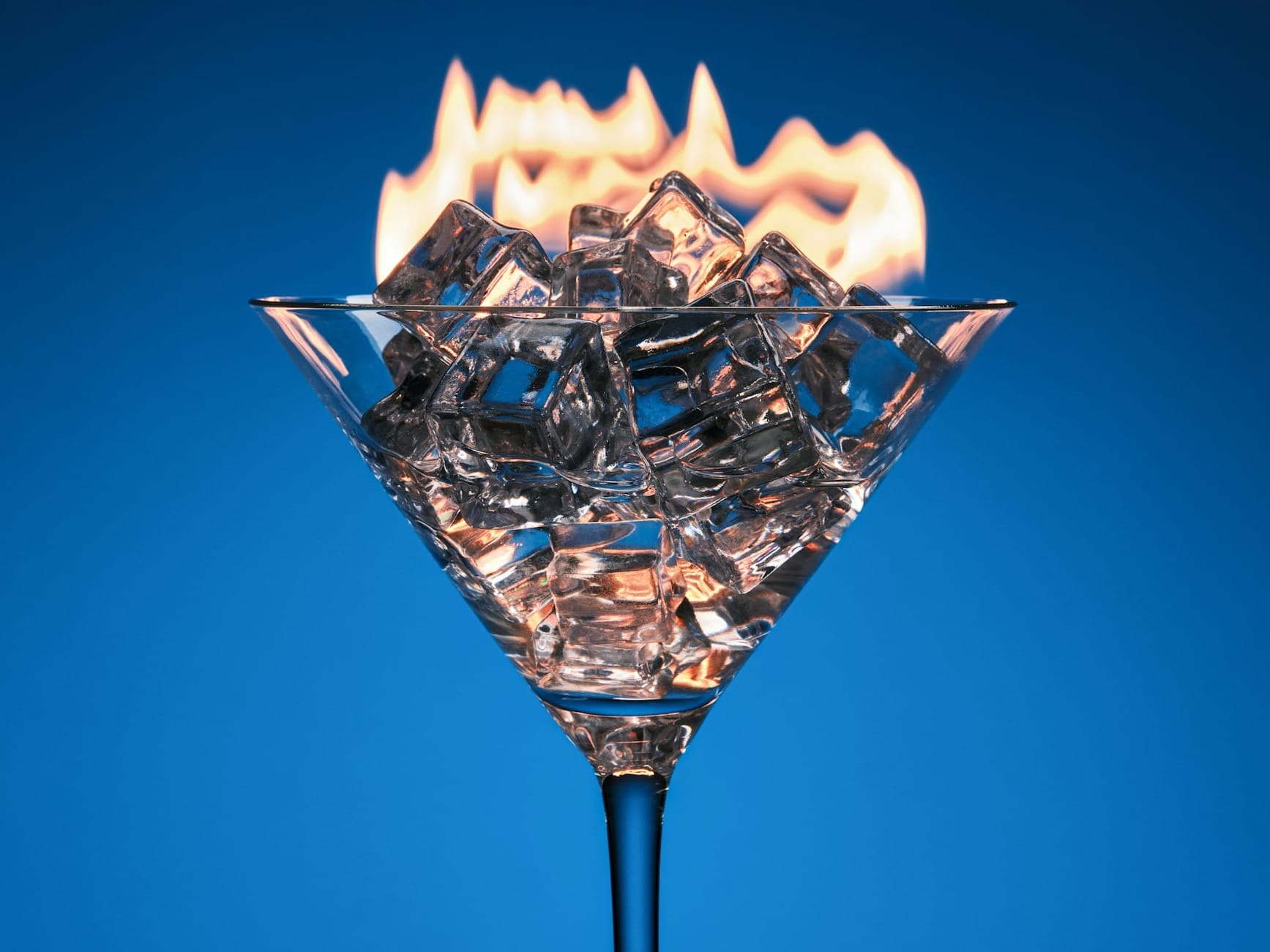 clear wine glass with fire